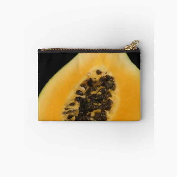 Item preview, A sliced papaya on a black background designed and sold by tethysimaging.