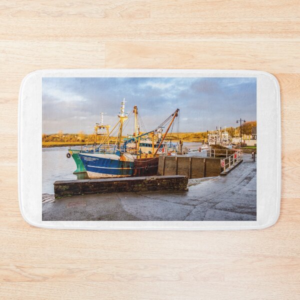 Item preview, Fishing trawlers moored at Kirkcudbright harbour on the River Dee at sunset in winter, Dumfries and Galloway, Scotland designed and sold by SnapTPhotograph.