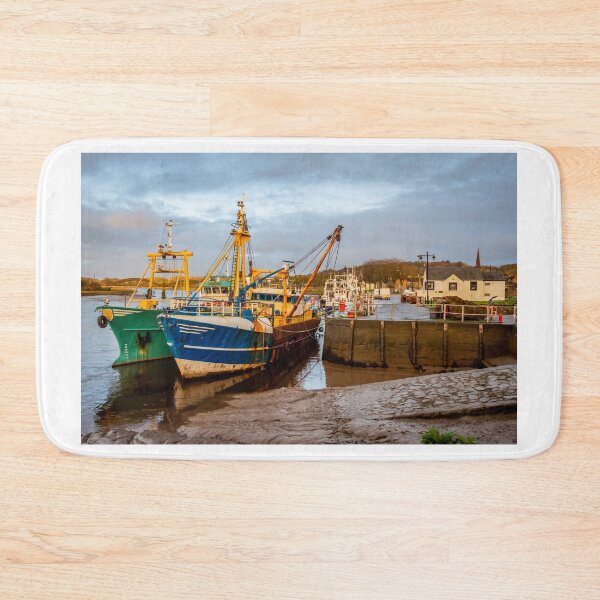 Item preview, Fishing trawlers moored at Kirkcudbright harbour on the River Dee at sunset in winter, Dumfries and Galloway, Scotland designed and sold by SnapTPhotograph.