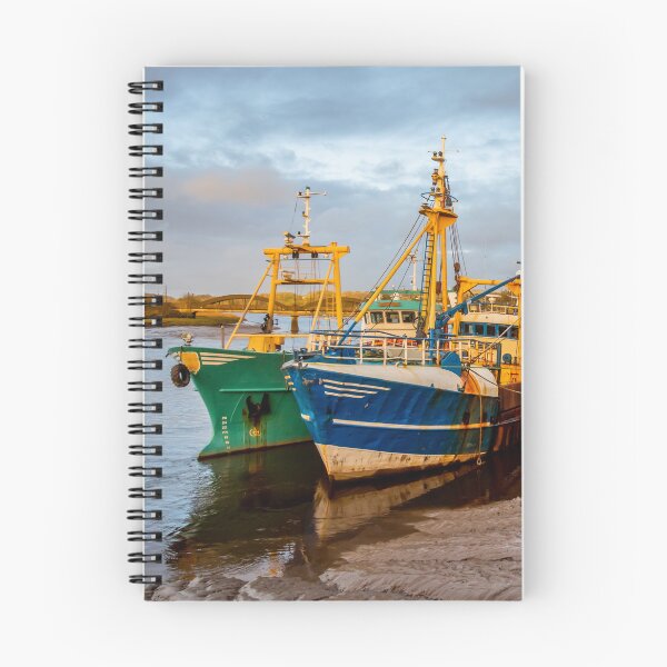 Item preview, Fishing trawlers moored at Kirkcudbright harbour on the River Dee at sunset in winter, Dumfries and Galloway, Scotland designed and sold by SnapTPhotograph.