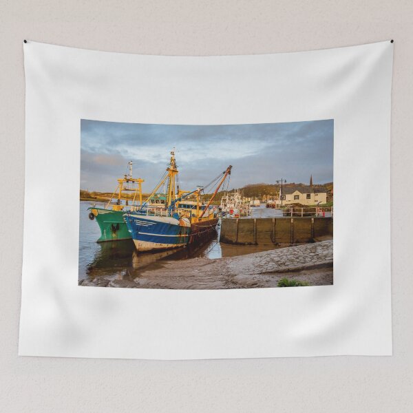 Item preview, Fishing trawlers moored at Kirkcudbright harbour on the River Dee at sunset in winter, Dumfries and Galloway, Scotland designed and sold by SnapTPhotograph.