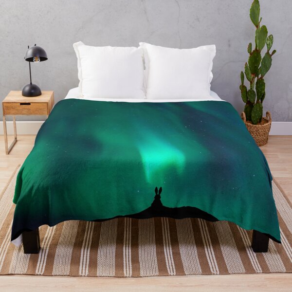 Item preview, Bunny Watching the Northern Lights designed and sold by humnoo.