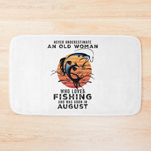 Item preview, Never Underestimate An Old Woman Who Loves Fishing And Was Born In august designed and sold by happy gift art.