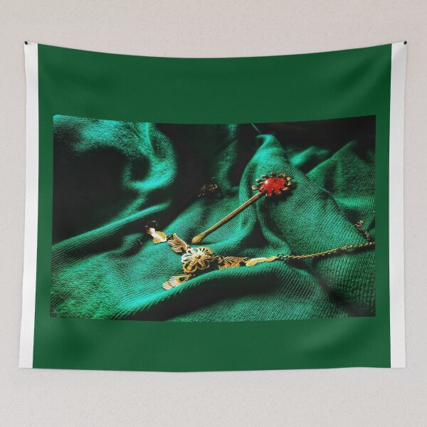 Item preview, gold juwelary in green backgroung designed and sold by APURU.