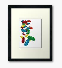 Falling Legos Framed Print