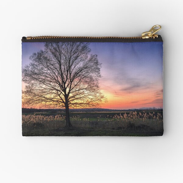 Item preview, Lonely bare tree in the field at sunset designed and sold by Dejan Travica.