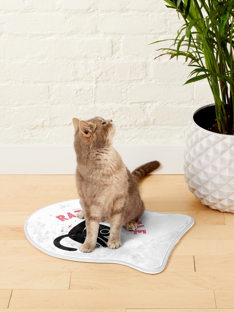 sneaky cat Bath Mat for Sale by lauragraves