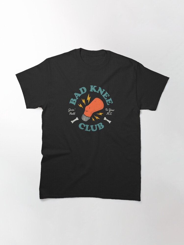 Thumbnail 3 of 7, Classic T-Shirt, Bad Knee Club – Givin' Hell To Your ACL designed and sold by thedesigngarden.