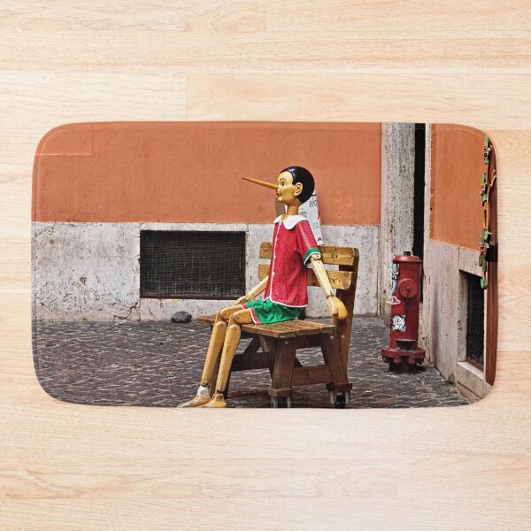 Item preview, Pinocchio Marionette Sitting on Street Bench, Rome Italy designed and sold by Anna Lemos.