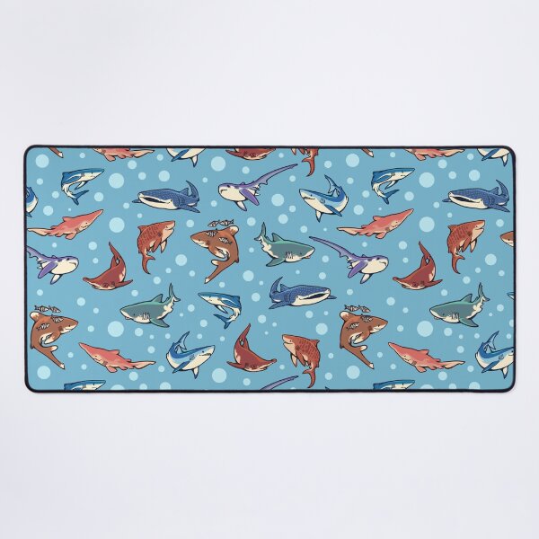 Sharks in the light blue Desk Mat