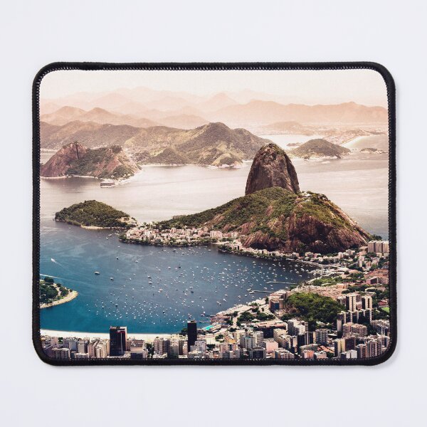 Item preview, Aerial view of Brazil's Rio de Janeiro and its beaches, buildings, and boats on blue waters, with hills and mountains nearby. designed and sold by raulgam22.