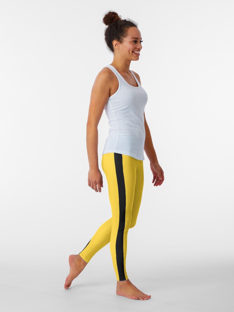 yellow leggings with black stripe