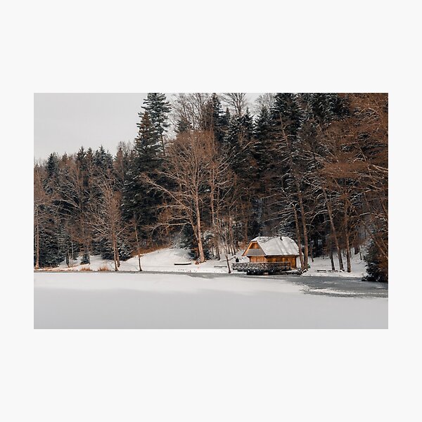 Log Cabin By A Frozen Lake Photographic Print