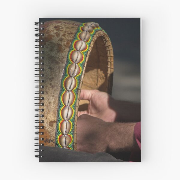 Item preview, Playing Mbira designed and sold by Clare Colins.