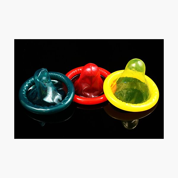 Item preview, A close up image of colored condoms designed and sold by tethysimaging.