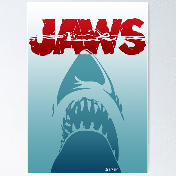 JAWS LOGO with GREAT WHITE SHARK FIN EMERGING FROM THE OCEAN