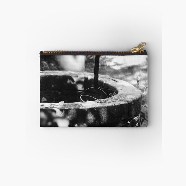 Item preview, Black and white photo of an old well at an authentic Dutch farm in the Netherlands designed and sold by Diana van Neck.