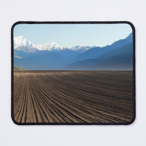 Item preview, plowed field and mountains in distance landscape designed and sold by goceris.