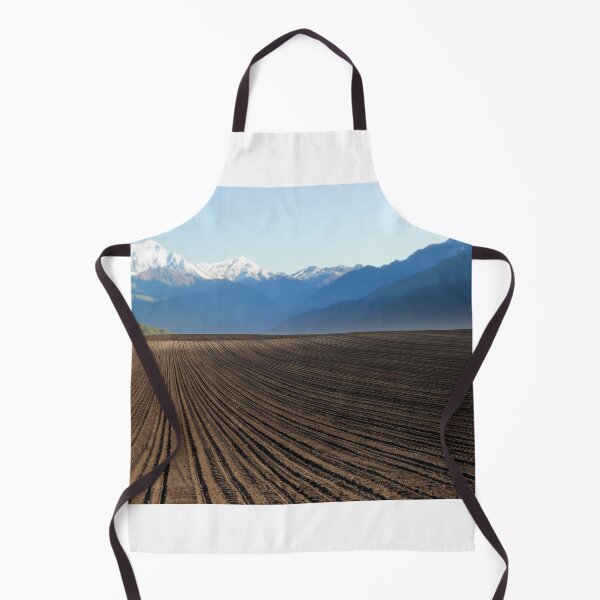 Item preview, plowed field and mountains in distance landscape designed and sold by goceris.