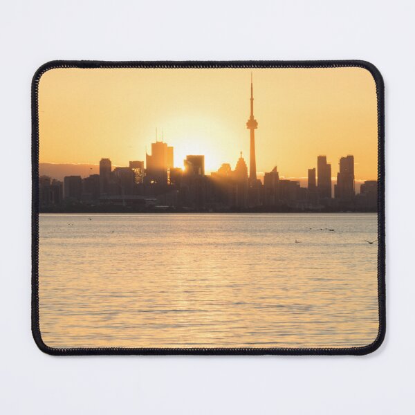 Item preview, Golden Glow - Sun Rising Behind Toronto Skyline designed and sold by Georgia Mizuleva.