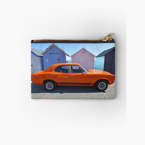 Item preview, Classic Orange Ford Cortina MK3 Car Parked in front  of beach huts. designed and sold by Umdash919.