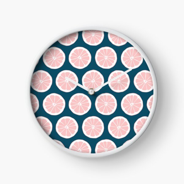 Pink Grapefruit Slices on Navy Blue Background Clock