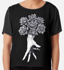 Hand with lotuses on black Chiffontop