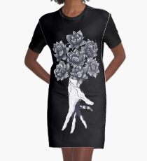 Hand with lotuses on black T-Shirt Kleid