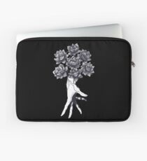Hand with lotuses on black Laptop Sleeve