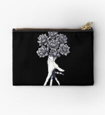 Hand with lotuses on black Studio Pouch