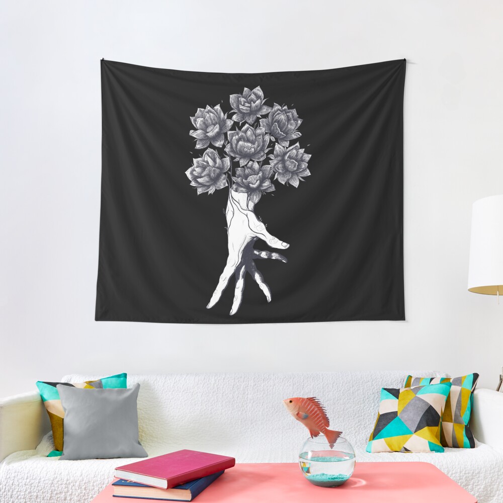 Hand with lotuses on black Tapestry