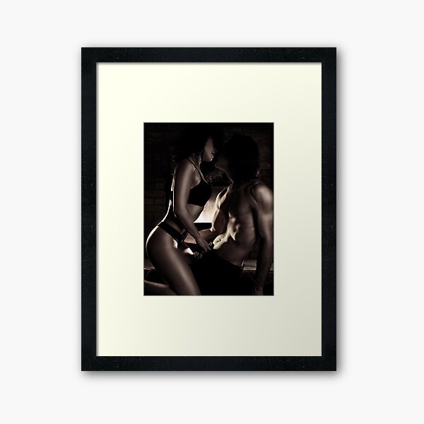 Item preview, Sexy couple kissing making love in front of a fireplace art print designed and sold by AwenArtPrints.