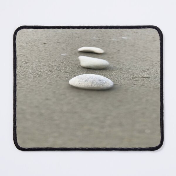 Item preview, Simple closeup view of vertically arranged three white stones on grey sandy beach designed and sold by Khala.