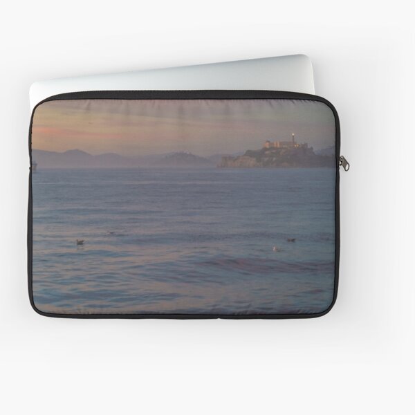 Boat Sailing Past Alcatraz Island In San Francisco Laptop Sleeve