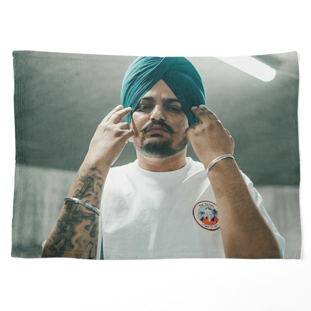 That's some dedication… (tattoo of slain Indian rapper Sidhu Moose Wala) :  r/ATAAE