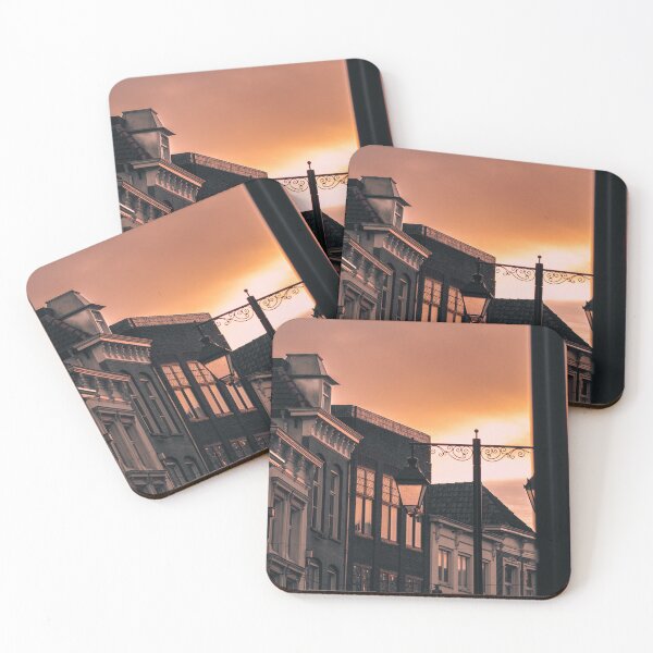 Item preview, Inner city rooftops against orange sunset designed and sold by roeltimmermans.