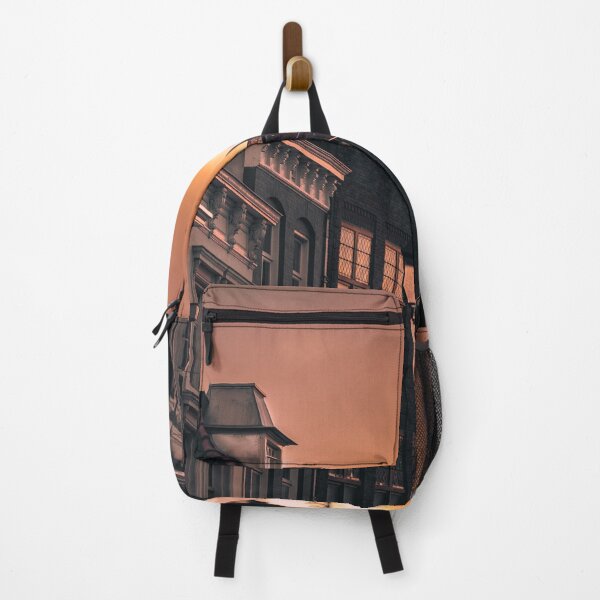 Item preview, Inner city rooftops against orange sunset designed and sold by roeltimmermans.