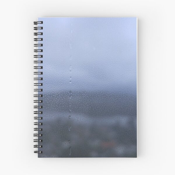 Item preview, Rain water droplets on glass with out-of-focus landscape background designed and sold by Travis Peterson.