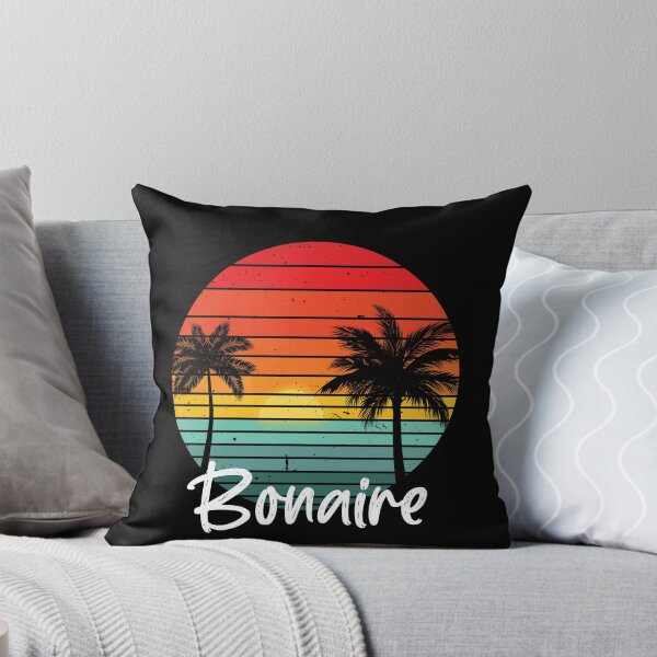 Aperçu de l'œuvre Bonaire souvenir rétro coucher de soleil palmier sur fond noir créée et vendue par TipTopTapo.
