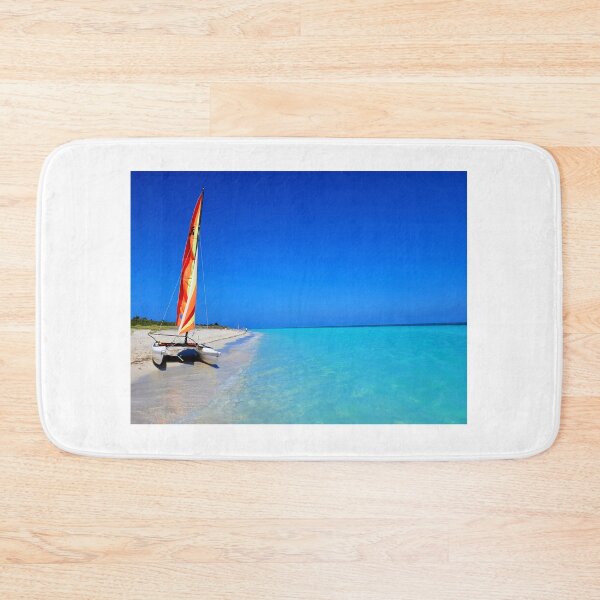 Item preview, Catamaran sitting on a sunny beach under blue skies designed and sold by Aviation Tees.