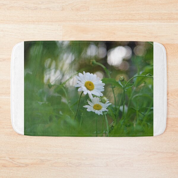 Item preview, White daisy flower among green grasses with a nice bokeh. designed and sold by santoshputhran.