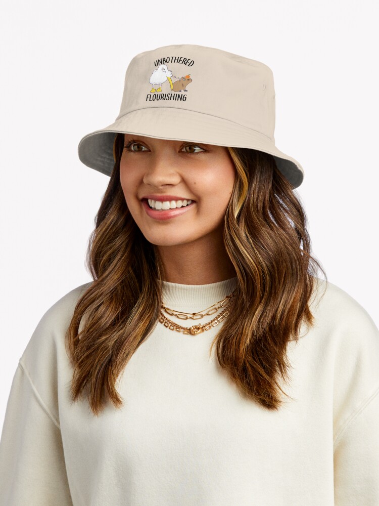 Unbothered Flourishing Capybara Pelican Funny Meme Cute Meme Bucket Hat  for Sale by alltheprints