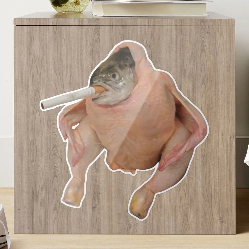 chicken with a fish head smoking a cigarette chaoticfoods chicken carcass with a fish-head