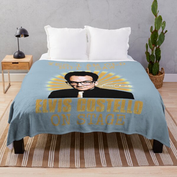 Artikelvorschau, Sie brauchen HITS ELVIS COSTELLO DETOUR LIVE 2026 Lustiges Grafikgeschenk entworfen und verkauft von MorganPillory.