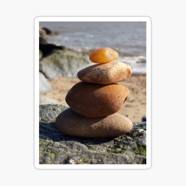 Stack of pebbles at the beach Sticker