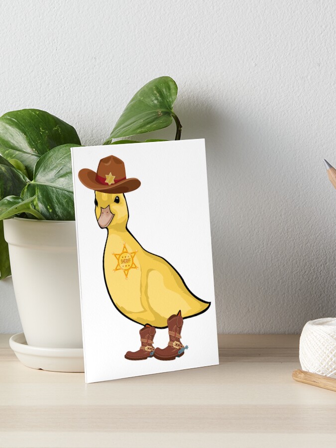 Sheriff duck wearing cowboy hat and boots -- Western Texas