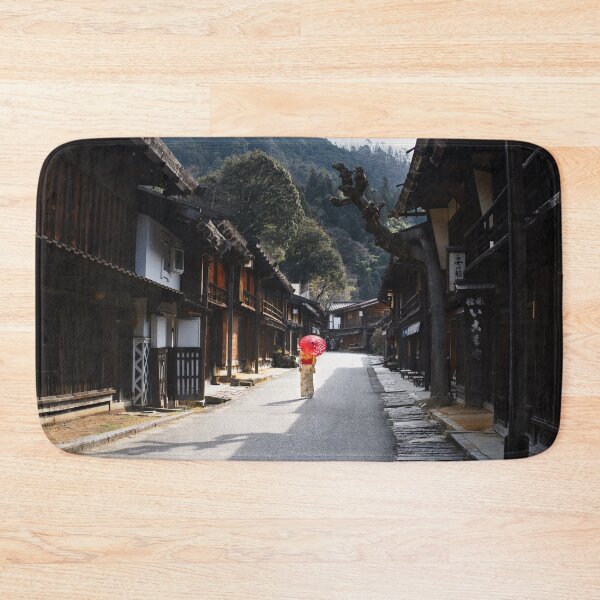 Item preview, Woman under red umbrella walking along the street in rural Japan designed and sold by Raureif.