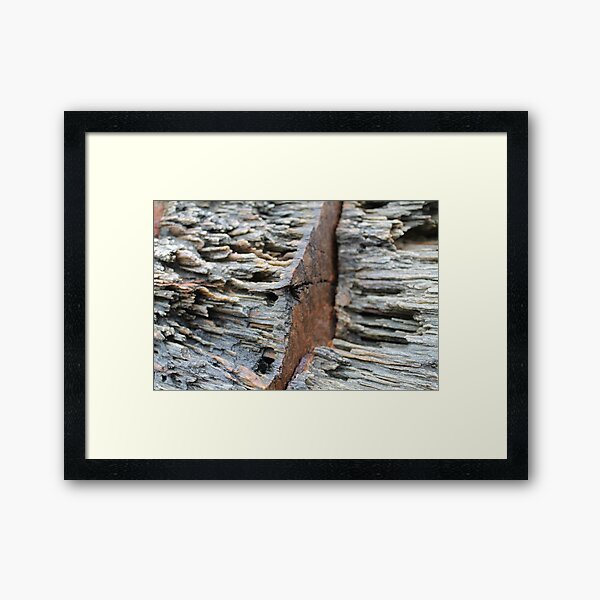 rusted rocks Framed Art Print