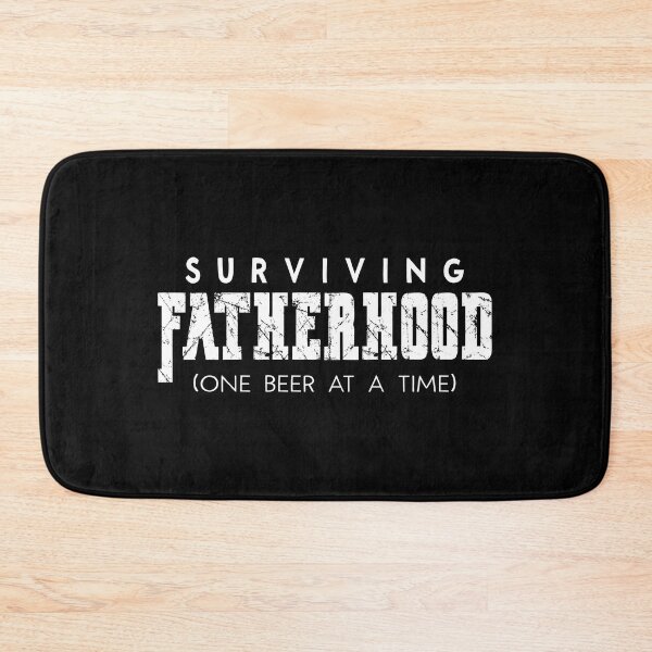 Item preview, Mens Surviving Fatherhood graphic New Dad Tee Fathers Day design designed and sold by Merchking1.