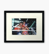 fighters embrace Framed Print